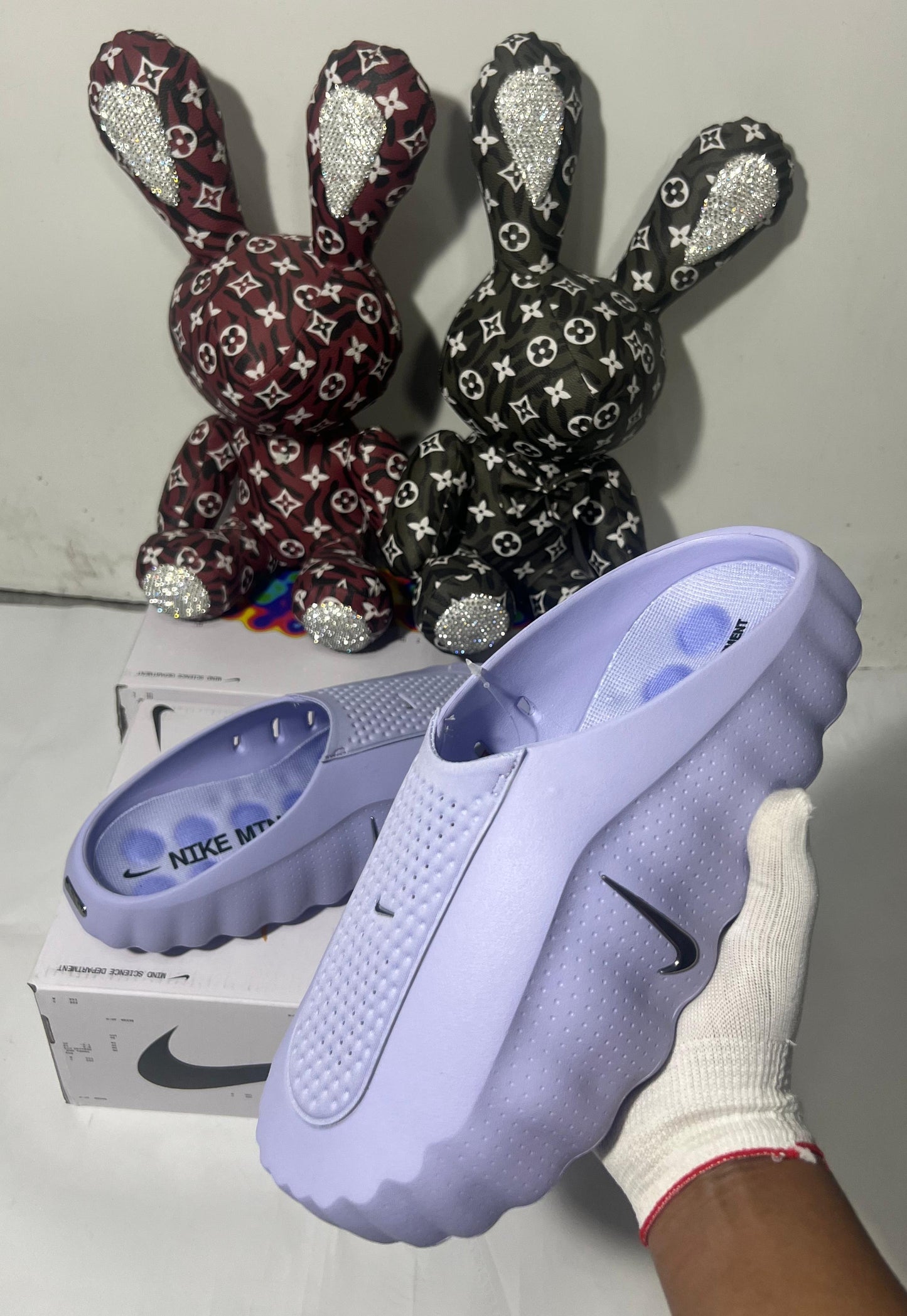 Nike Mind 001 mules in the "Palest Purple"π